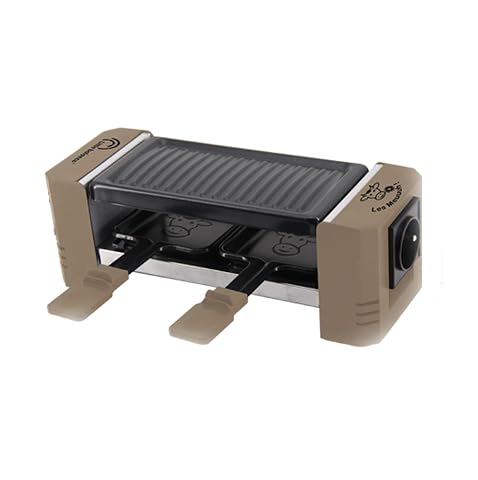 Raclette-grill compacte avec deux poêlons et spatules en bois sur une table en bois clair