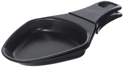 Deux coupelles ovales noires Tefal pour raclette, dont une garnie de fromage fondu